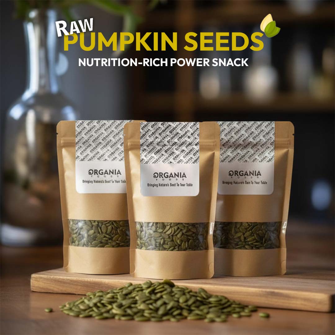 Three packages of Organia raw pumpkin seeds on a wooden board with a blurred background