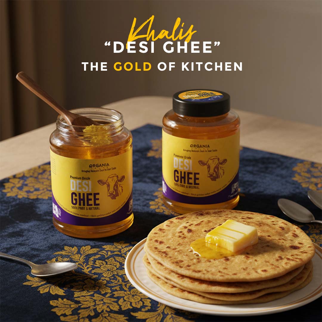 Two jars of 'Desi Ghee' on a table with flatbreads and butter, featuring the brand name 'Khalis'.
