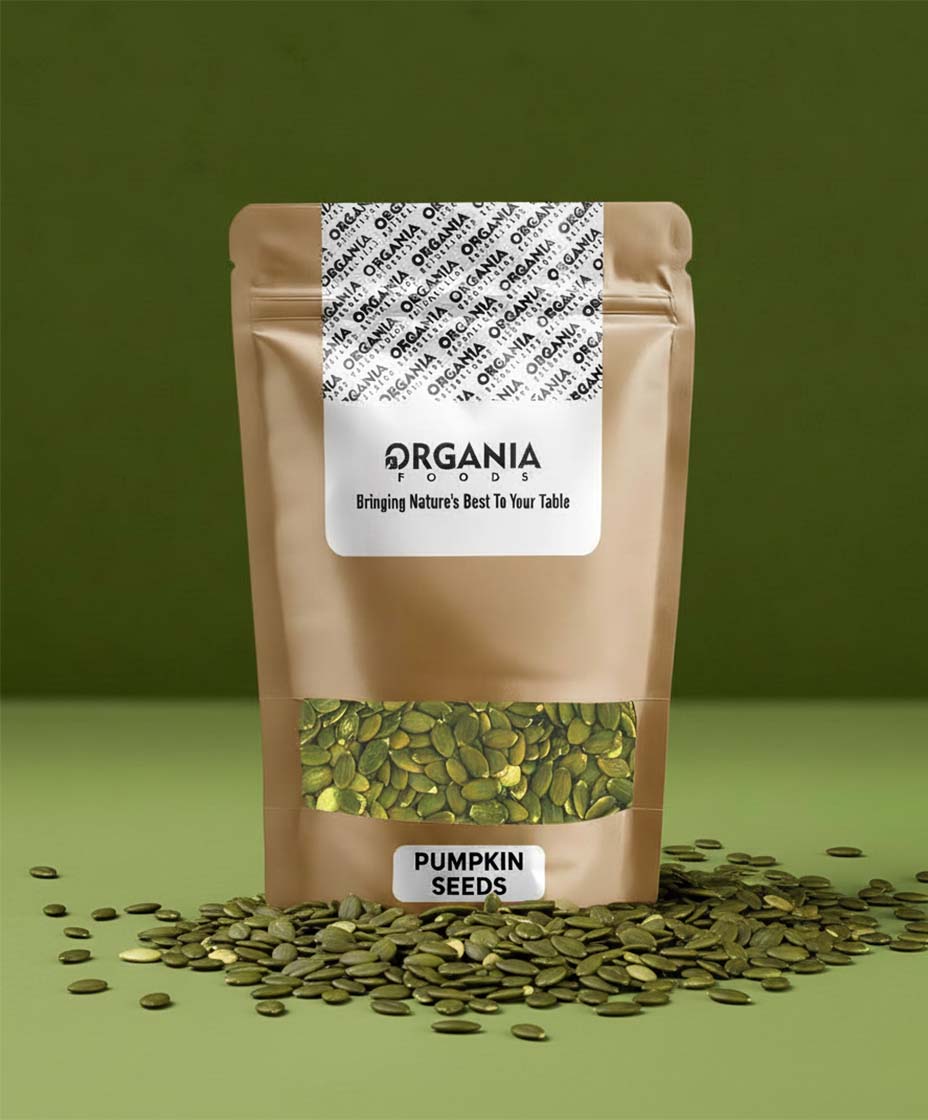 Bag of pumpkin seeds with 'Organia' label on a green background